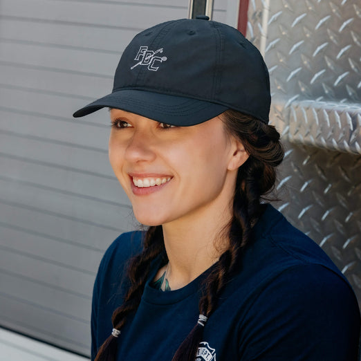 Natalie wearing the Black Pike Pole Dad Hat