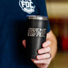 The Give Me Coffee tumbler being held.