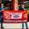 Jason and Fenton holding the NHRA Banner