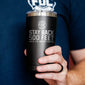 The Stay Back Tumbler being held