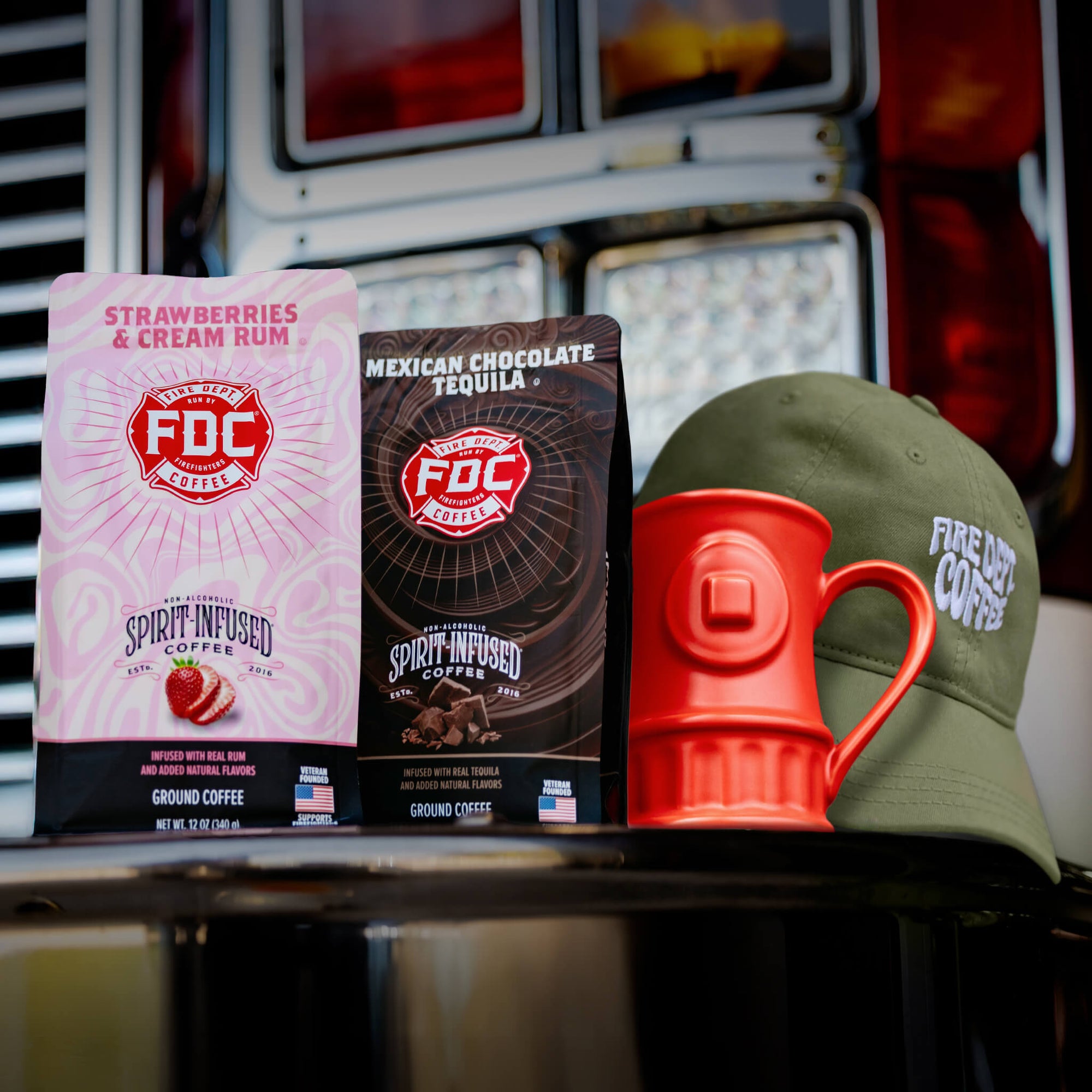 The In The Spirit Gift Bundle containing two Spirit infused Coffees, a fire hydrant mug, and a green dad hat.