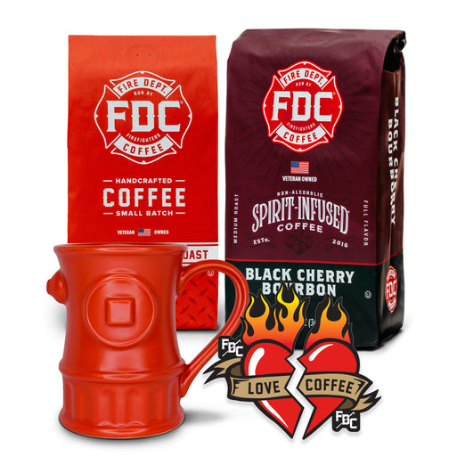 The Coffee Lovers Valentine’s Day Bundle, containing a bag of Original Medium Roast, a bag of Black Cherry Bourbon Infused Coffee, a set of Love Coffee Stickers, and a Fire Hydrant mug.