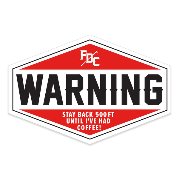 Hexagonal red sticker with FDC pike pole logo at the top and large "WARNING" written across the middle. Under "WARNING" reads "Stay back 500 ft until I've had coffee!"