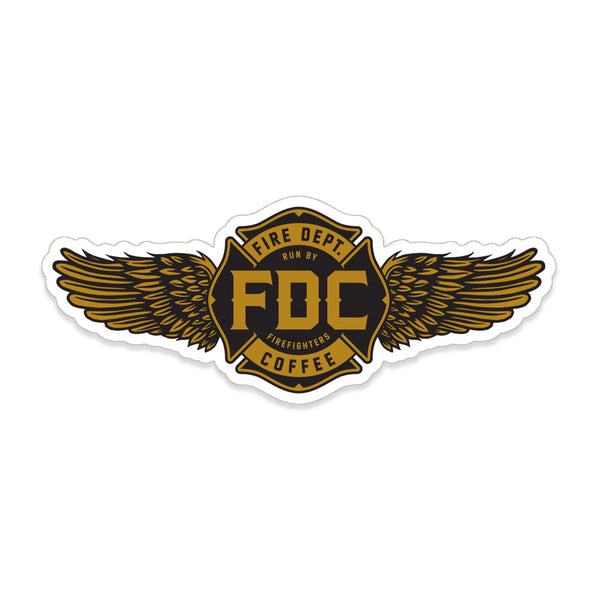 Sticker with FDC's maltese cross logo in gold and black with golden wings on either side.